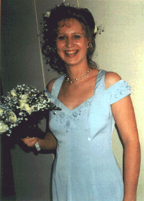 Happy bride with flowers.