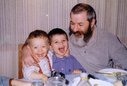 Michail and his cousin Alessandro during lunch, with pap Ettore - March 2003